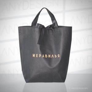 PRODUZIONE DI SHOPPING BAGS PROMOZIONALI - PRODUCTION OF PROMOTIONAL SHOPPING BAGS